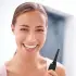 Girl with great smile holding Ortho Rinse Pick